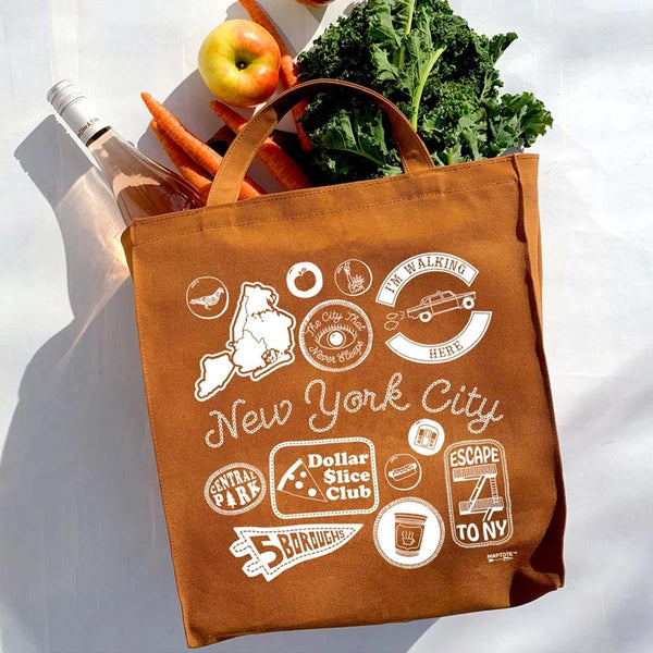 Brown New York City Grocery tote with white text and icons - groceries spilling out - lockwood shop - maptote