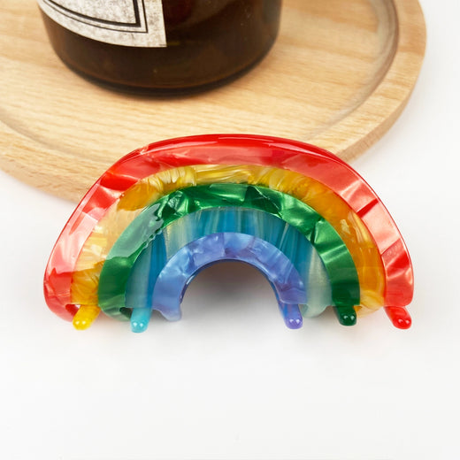 Rainbow hair clip on table