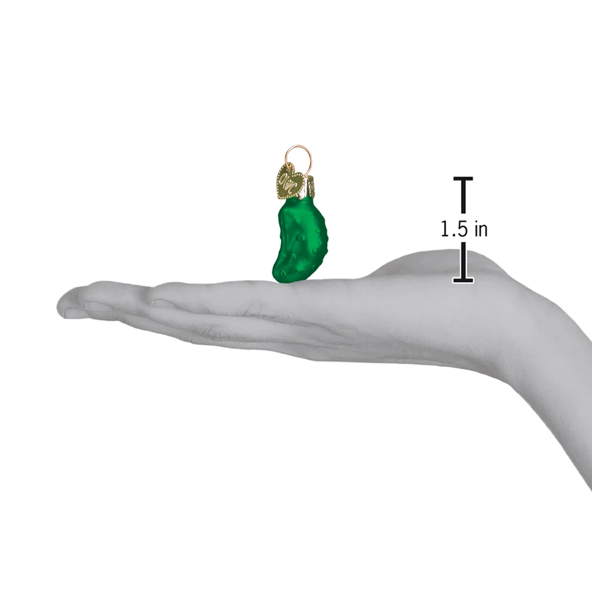 Tiny green ornament on a hand with a measurement indicator showing 1.5 inches.