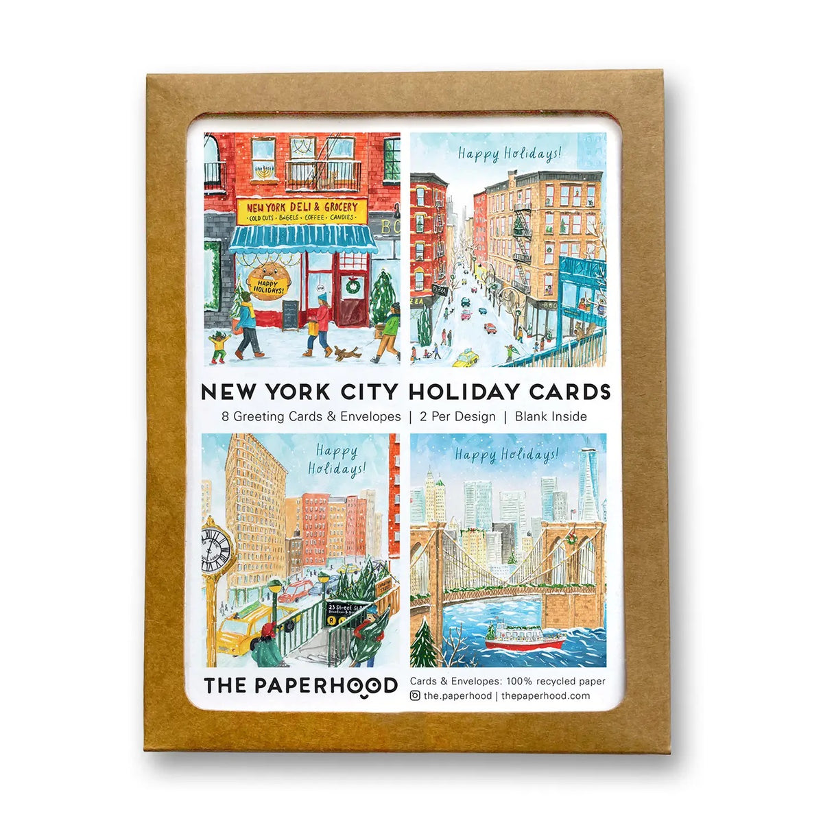 Pack of New York City holiday cards with illustrations of city scenes, displayed in a cardboard holder.