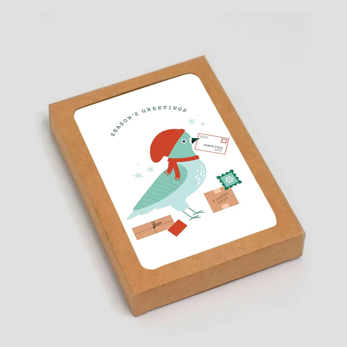 Card with a bird illustration and 'Season's Greetings' text, housed in a brown box.