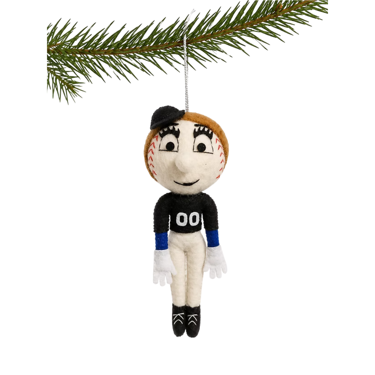 A handmade felt baseball player ornament hanging from a pine branch. The character has an off-white baseball face with red stitching, a black cap, a black jersey with white '00' on the chest, blue sleeves, cream pants, white gloves, and black shoes.
