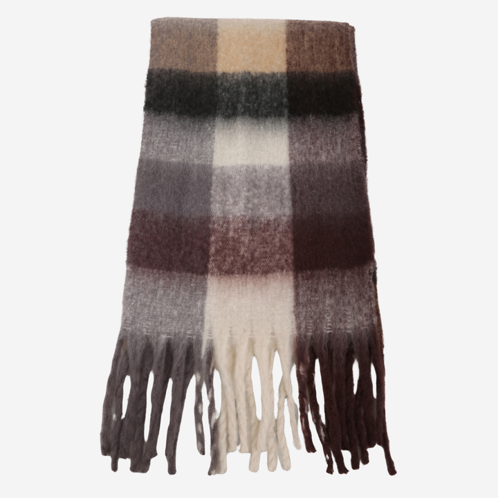 A folded plaid scarf with fringe tassels  in neutral tones of beige, brown, gray, and black, styled against a soft grey background.