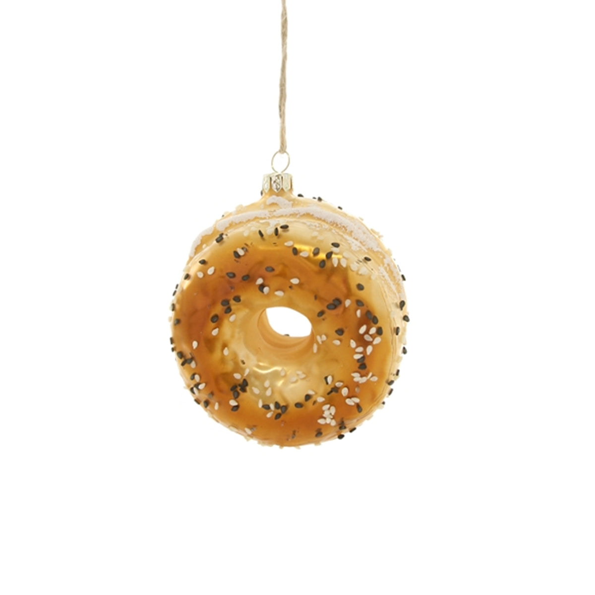 Decorative bagel ornament with sesame seeds on a white background