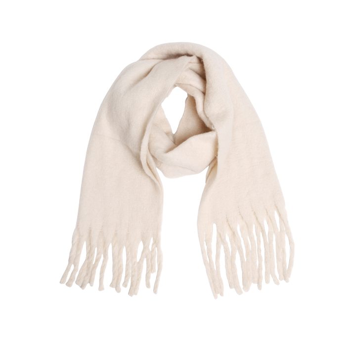 A cream-colored knit scarf with fringed ends, neatly folded and displayed against a solid white background.