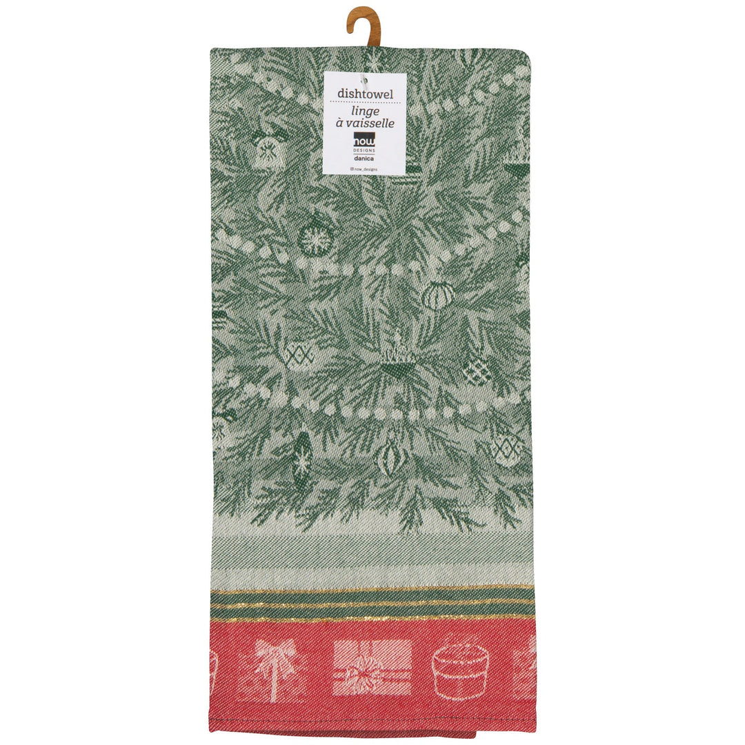 A green and white patterned kitchen dish towel with a red bottom border featuring holiday motifs, hanging from a wooden hanger with a white product label.