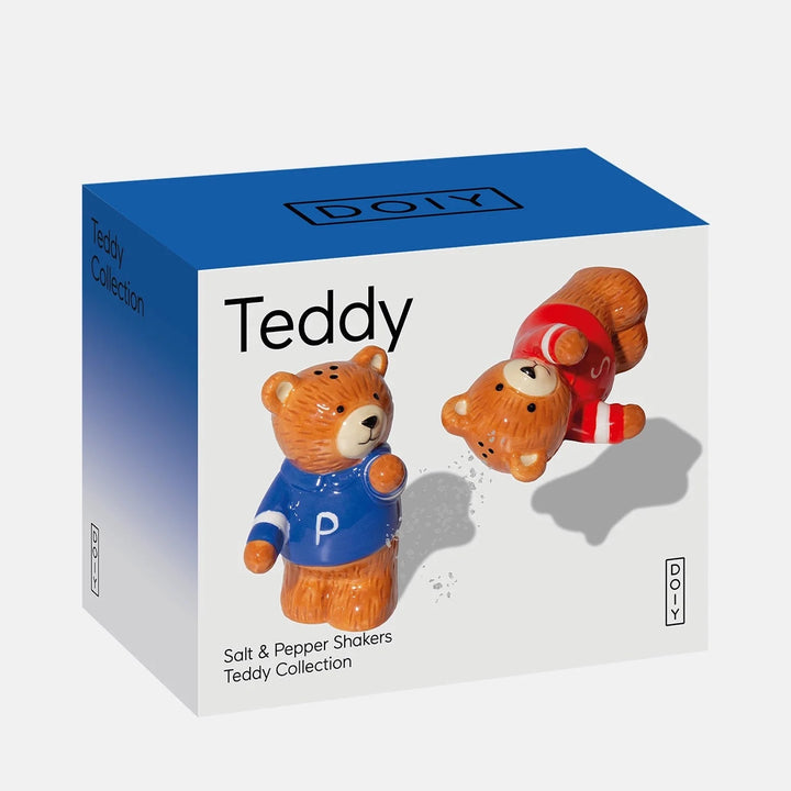 Boxed salt and pepper shakers from the DOY Teddy Collection, featuring two teddy bear figures on the front of the packaging. One bear wears a blue sweater with a white &