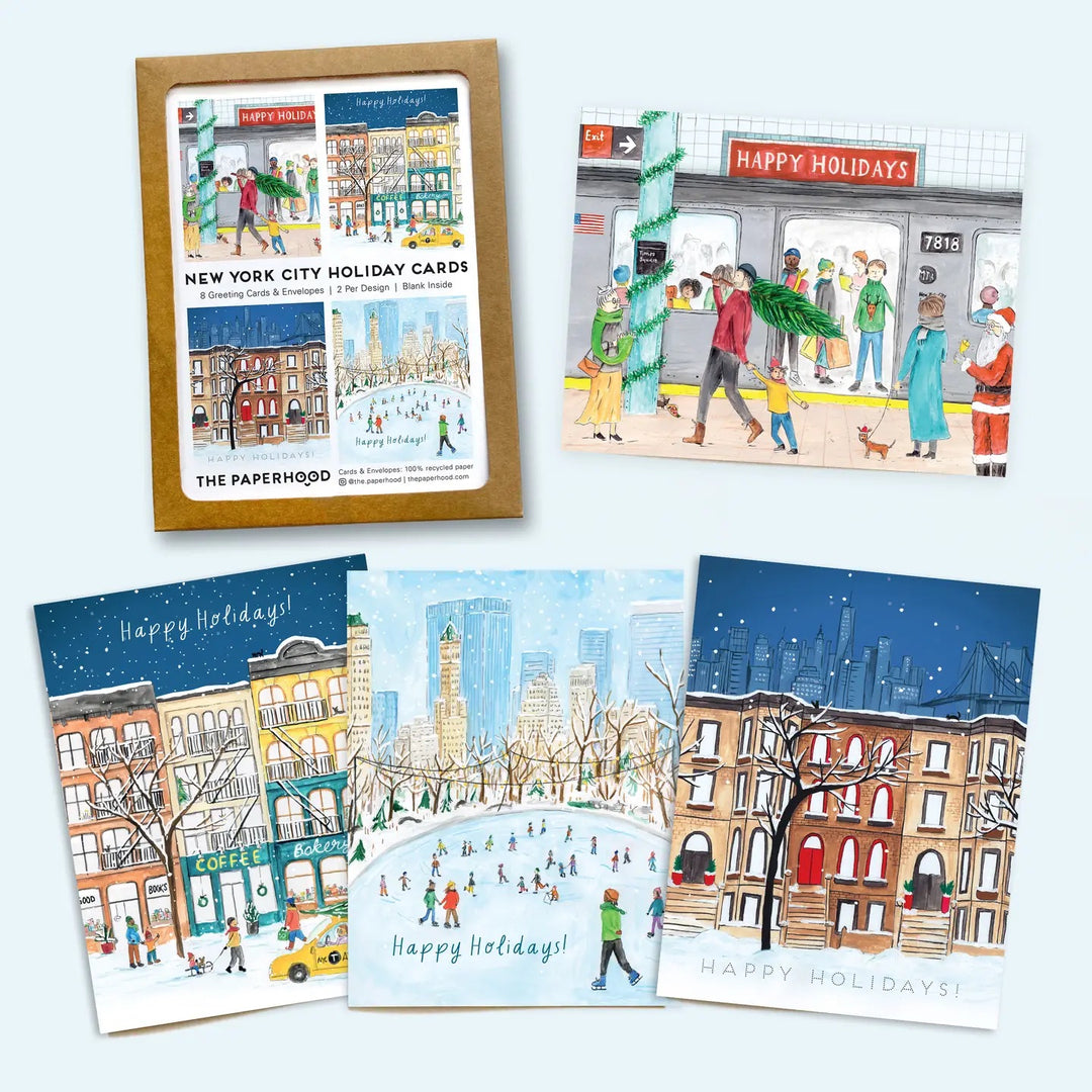 Set of New York City themed holiday cards with illustrations of snowy scenes and people.