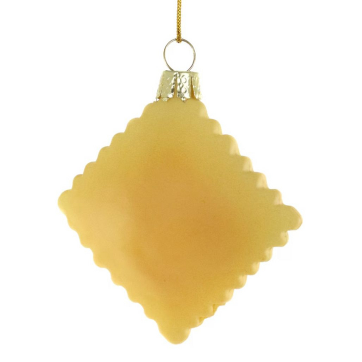 Yellow diamond-shaped Christmas ornament on a white background