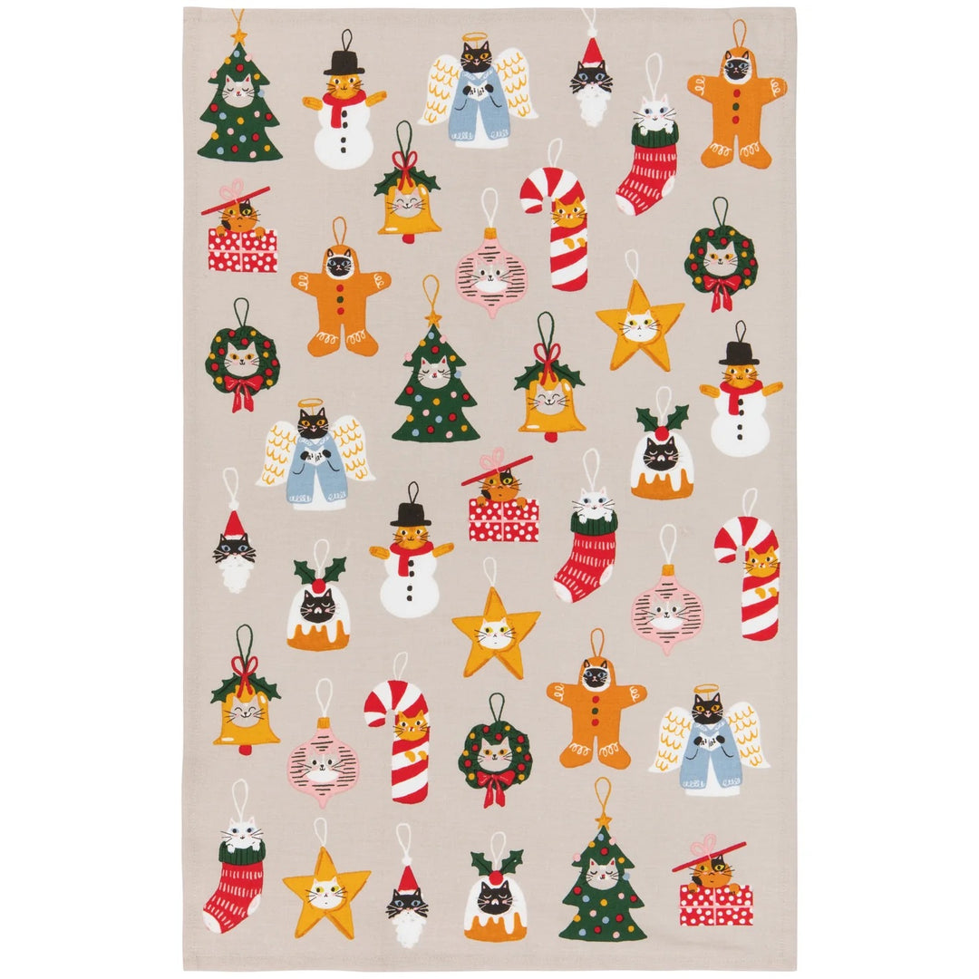 Beige fabric with colorful Christmas-themed decorations including trees, snowmen, and stars.