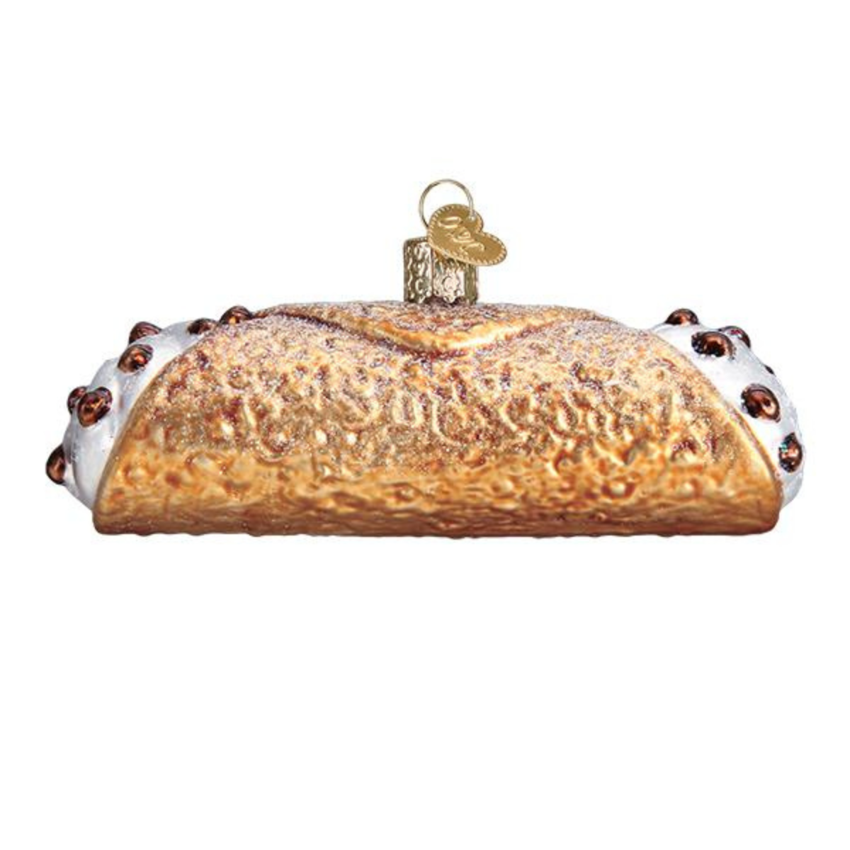 Glass ornament shaped like a loaf of bread with icing on a white background