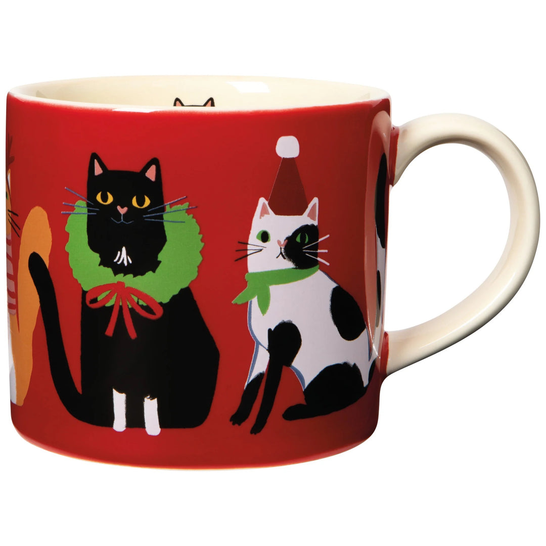 Red mug with black and white cat illustrations on a white background