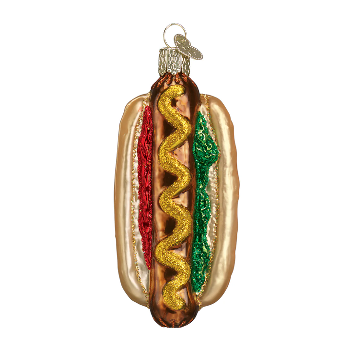 Hot dog ornament hanging on a white background.