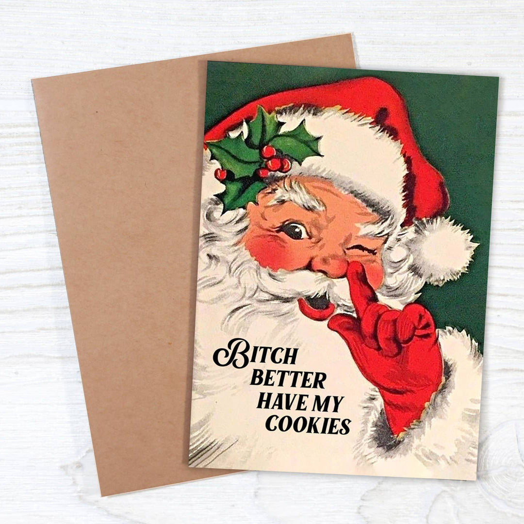 A Christmas-themed greeting card featuring a vintage illustration of Santa with the text &