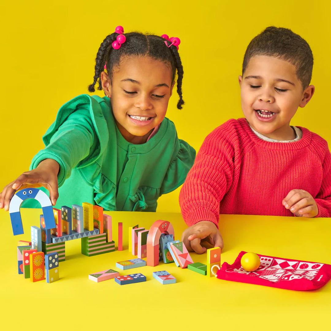Topple-Twist Dominoes