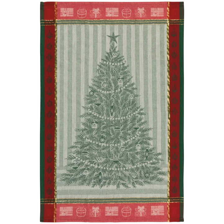A rectangular holiday-themed textile or mat featuring a large green Christmas tree motif in the center, bordered by red bands with small white festive icons and dark green side panels.