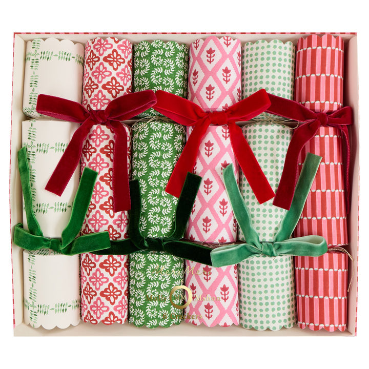 Set of patterned paper rolls with ribbons in a box
