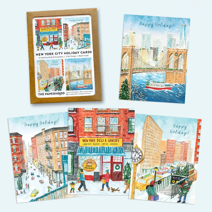 Set of New York City themed holiday cards with illustrations of buildings and scenes.