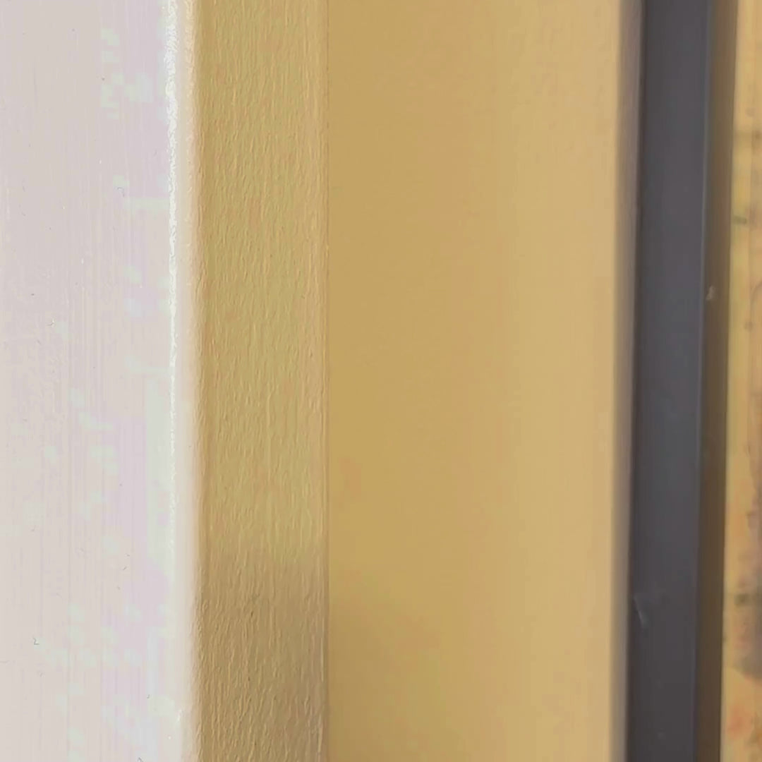 A video of an N train magnet being stuck to a wall and lighting up.