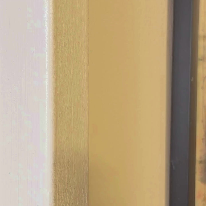 A video of an N train magnet being stuck to a wall and lighting up.
